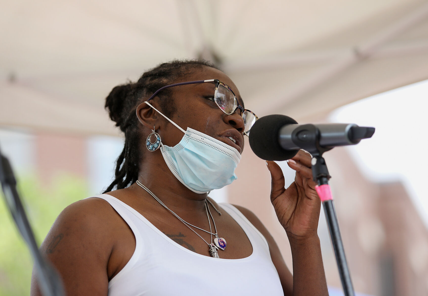 Cofounder and executive director of Boone County Community Against Violence Shaunda Hammilton speaks to a crowd of activists on Saturday in Columbia.